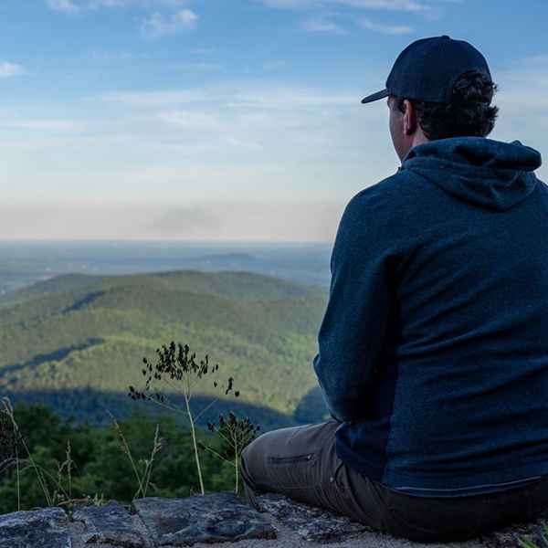 Park visitor looks east from a Skyline Drive overlook