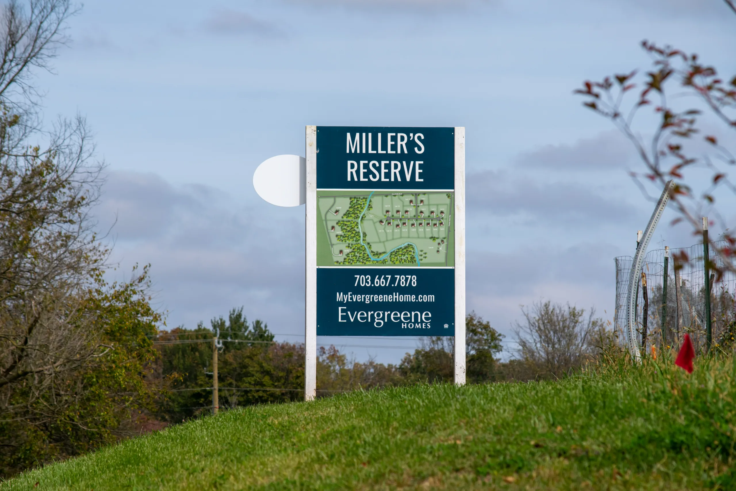 Miller's Reserve road sign with a map of lots