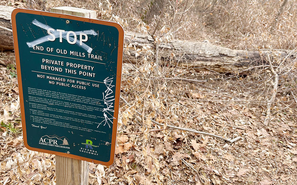 Sign saying "STOP End of Old Mills Trail"