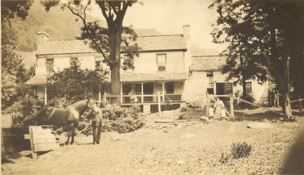 sepia historic image of a house