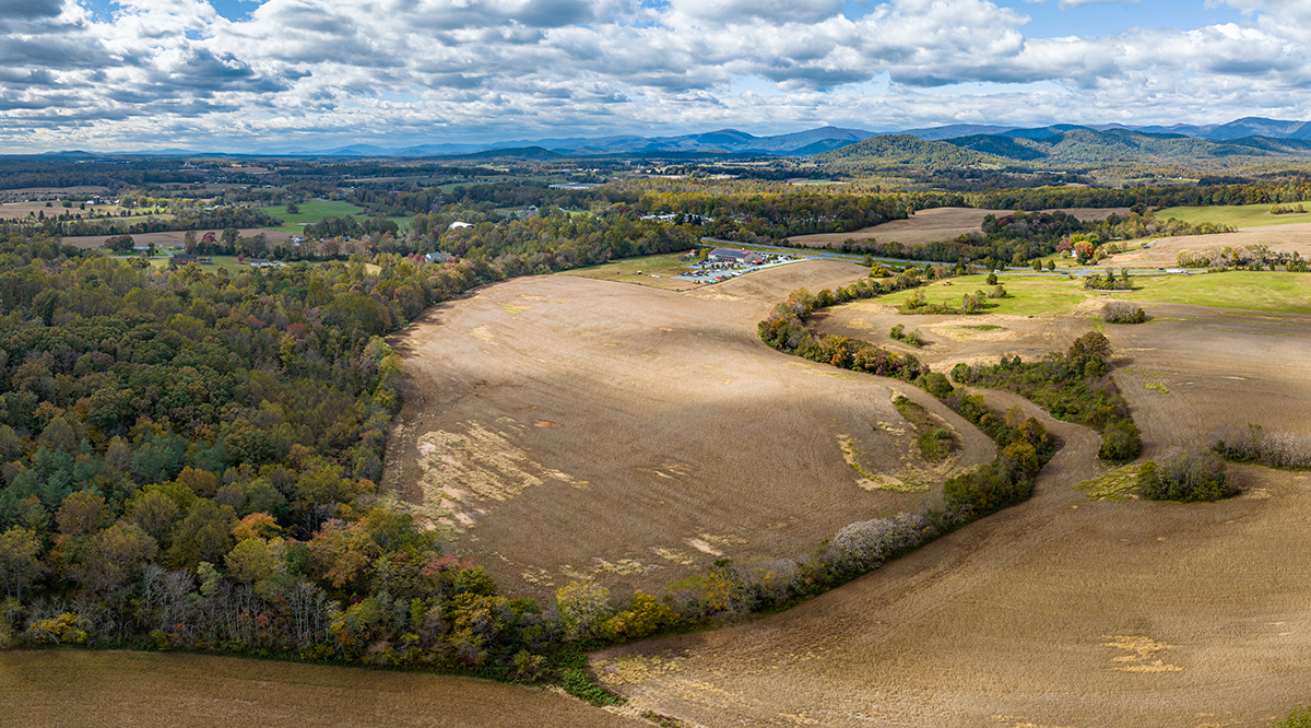 aerial view of a rural property abutting a indoor farm market