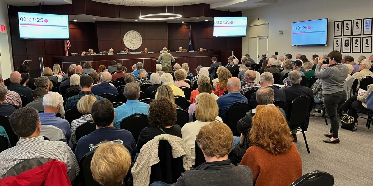 an audience in a board room