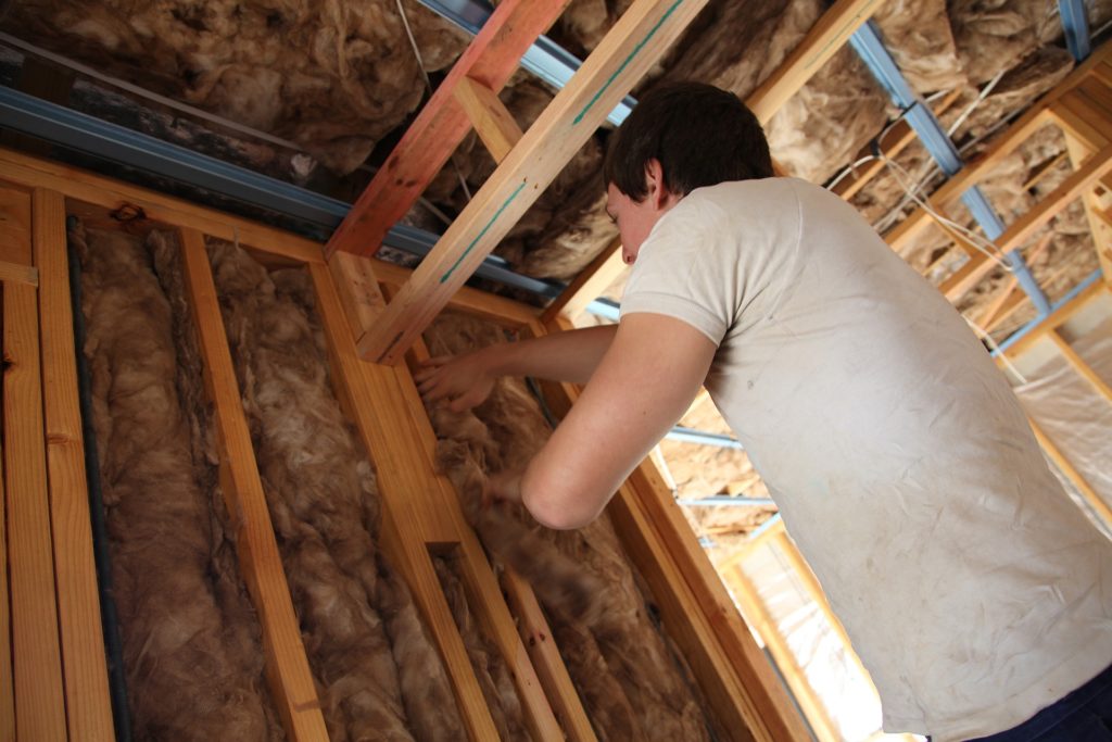 Installation of fiberglass batt insulation