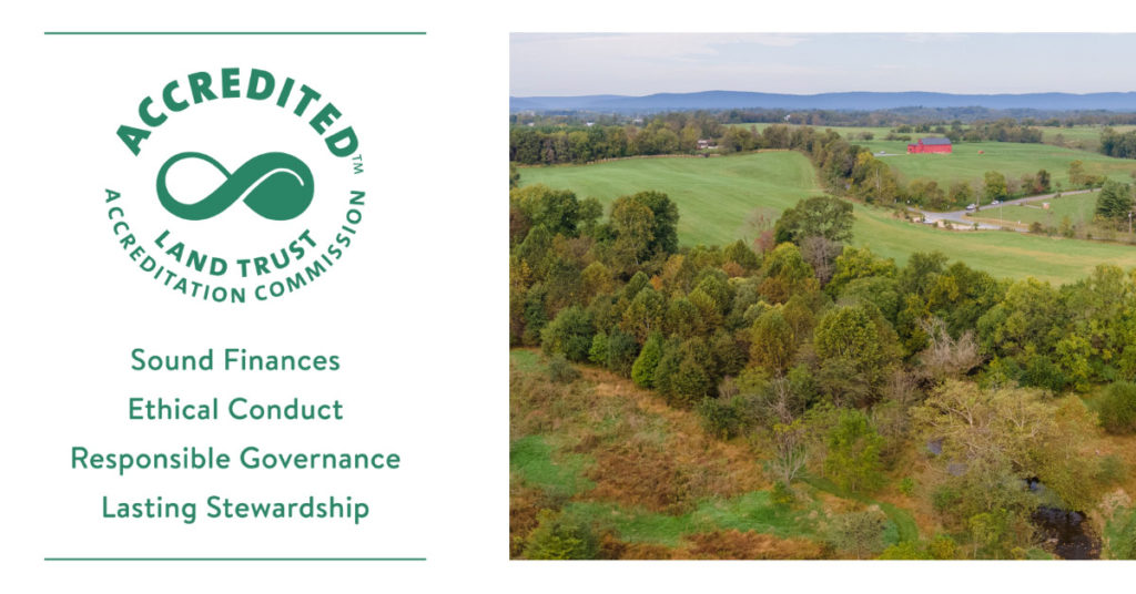 land trust accreditation logo and aerial photo of farmland