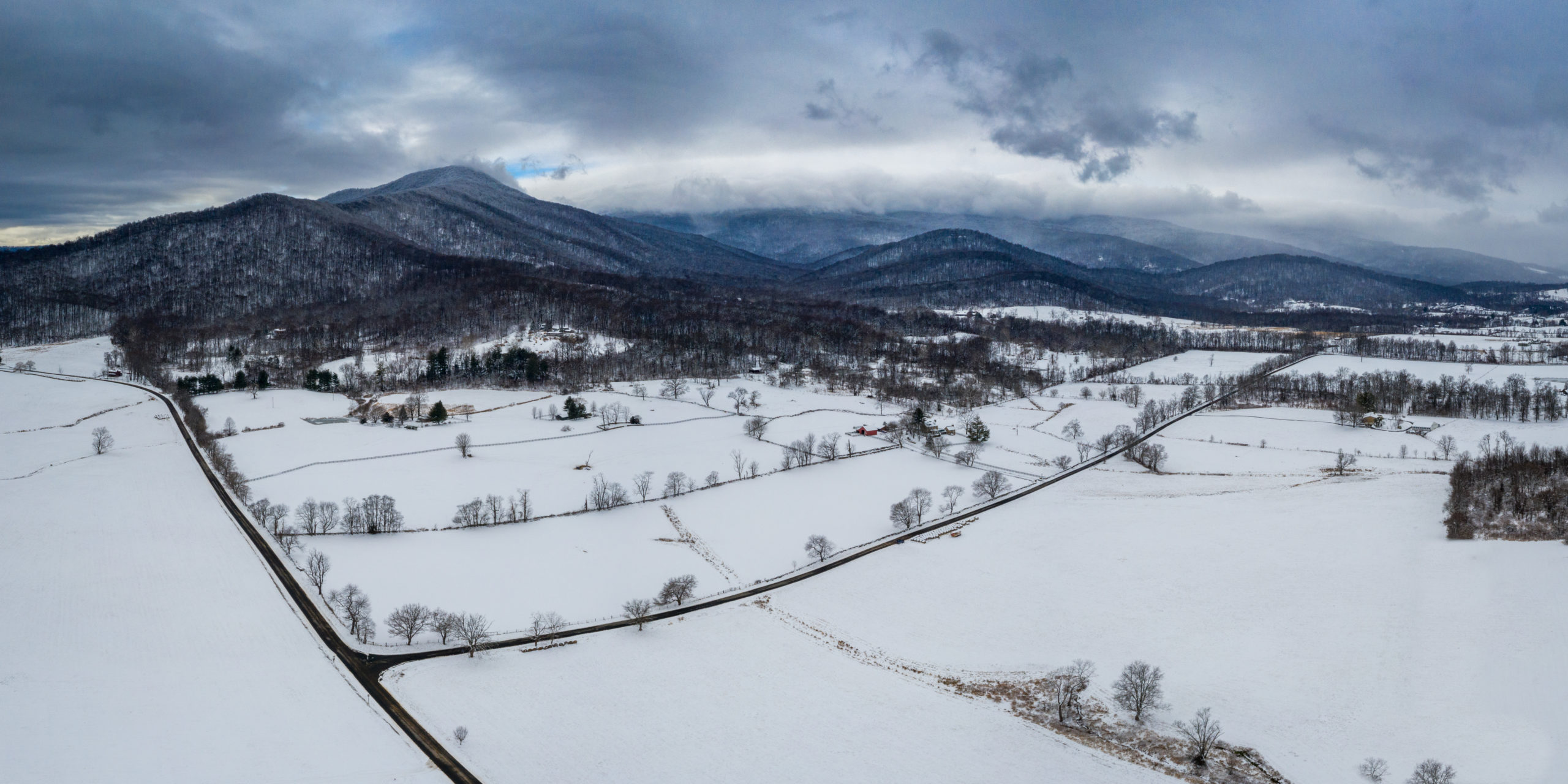 an aerial image of snowy mountains and fields in Rappahannock County