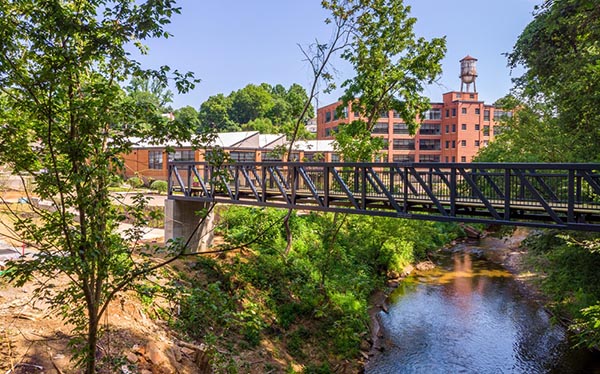 Connectivity Update / New Pedestrian Bridge Installed at Woolen Mills