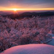 View of a snowy landscape at sunrise from Shenandoah National Park